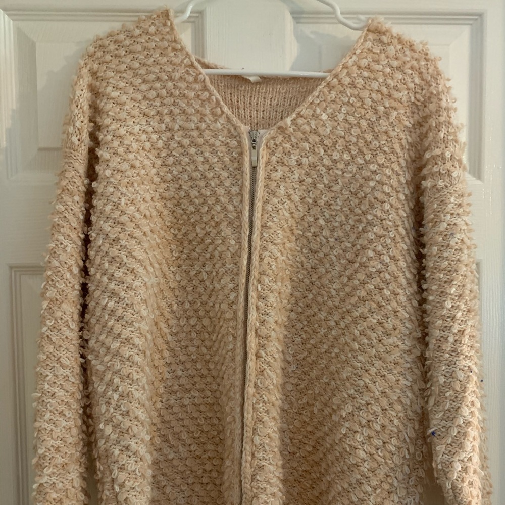 Soft pink knit zip sweater